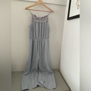 New blue halter jumpsuit with embroidery detail